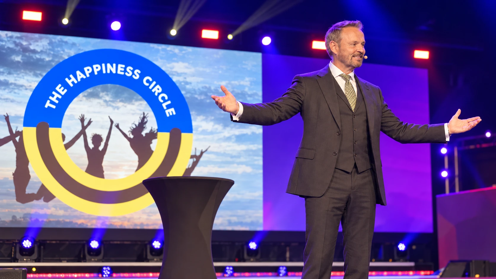 Dr. Sven Goebel — Happiness Circle, AI-reconstructed stage photo